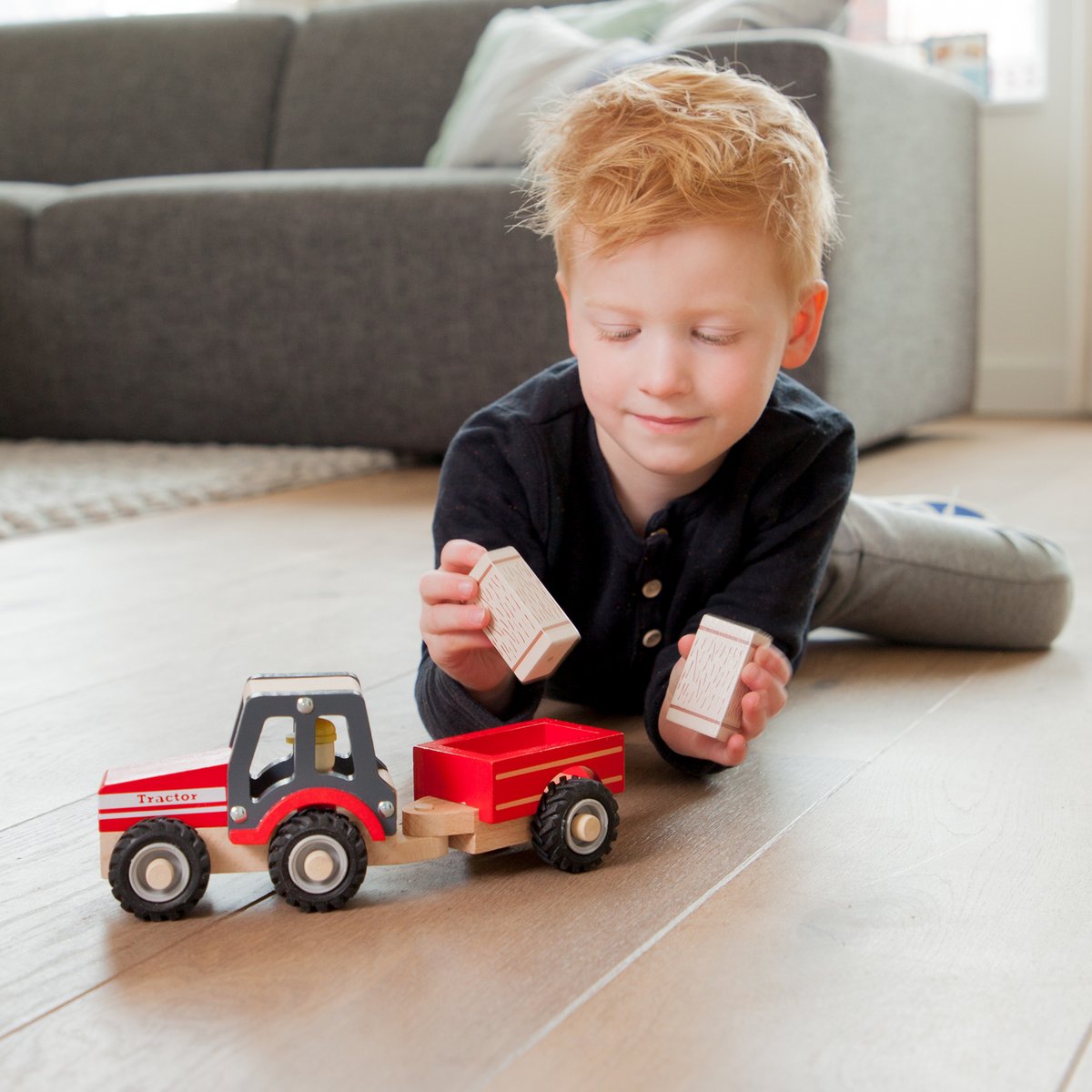 Tractor met aanhanger | Hooibalen